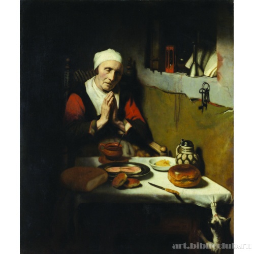 Пожилая женщина за молитвой