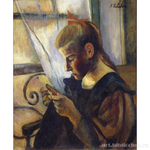 Девочка, занимающаяся вязанием