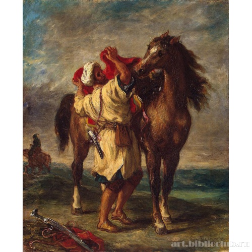 Марокканец, седлающий коня