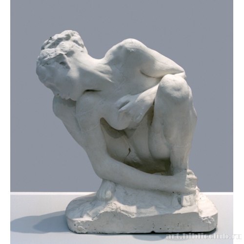 Сидящая на корточках