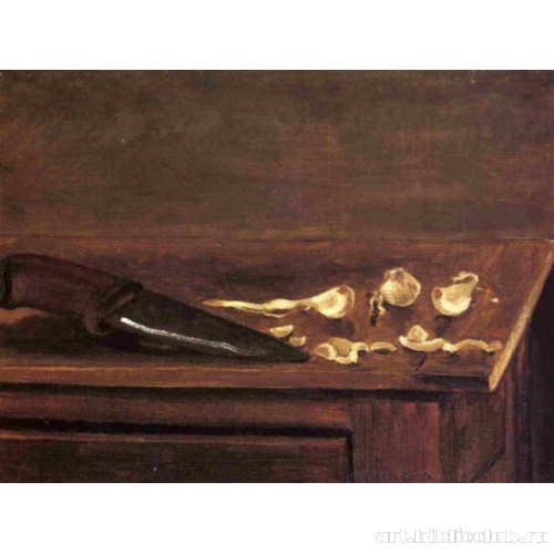 Чеснок и нож в углу стола