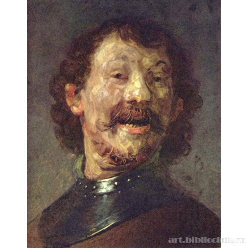 Смеющийся мужчина в стальном нагруднике