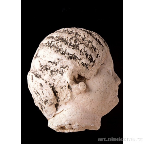 Голова от статуэтки девушки