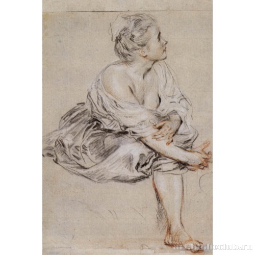 Сидящая молодая женщина