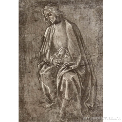 Сидящий молодой мужчина со сложенными руками