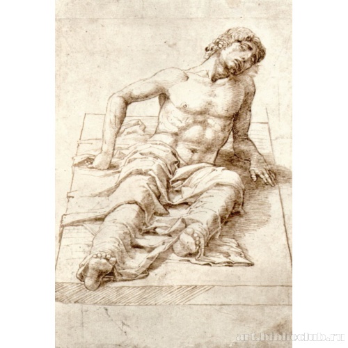 Мужчина, лежащий на каменной плите