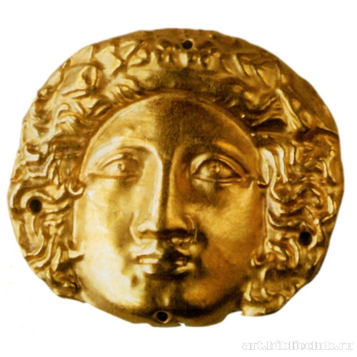 Бляшка нашивная круглая в форме головы менады или молодого Диониса