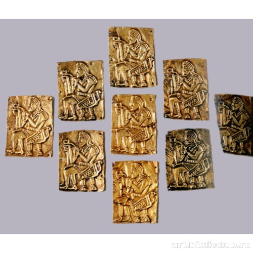 Бляхи с тисненым изображением сидящего скифа с ритоном и культовым скипетром-секирой