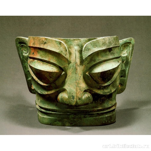 Ритуальная маска с кручковидным орнаментом