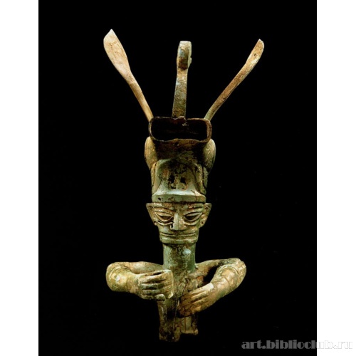 Фигура мужчины в рогатом головном уборе