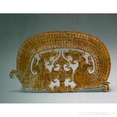 Пластина в виде пары изогнувшихся драконов