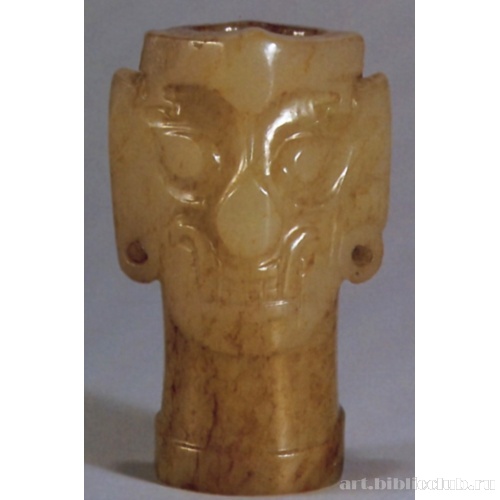 Голова божества или духа (вид спереди)