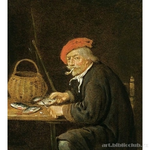 Мужчина потрошит рыбу