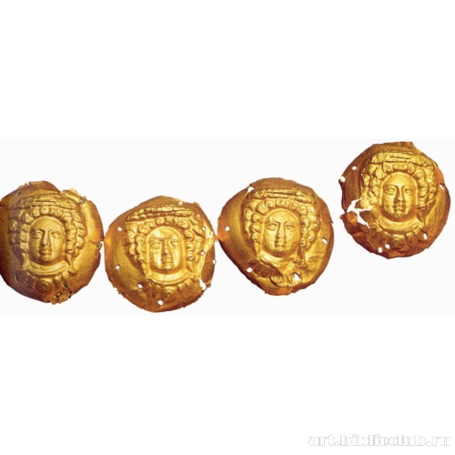 Бляшки с изображением женской головки. Фрагмент