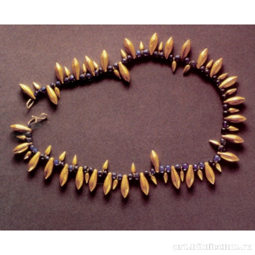 Ожерелье из круглых бусин фиолетового стекла