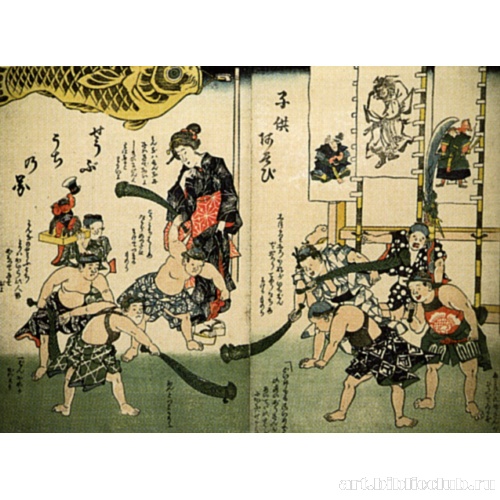 Дети играют с листьями ирисов